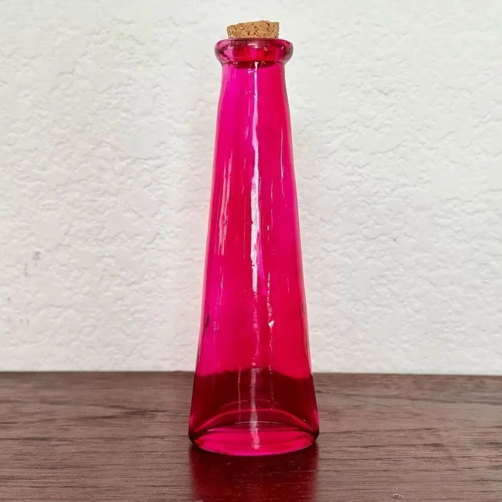 Vintage pink bottle with cork